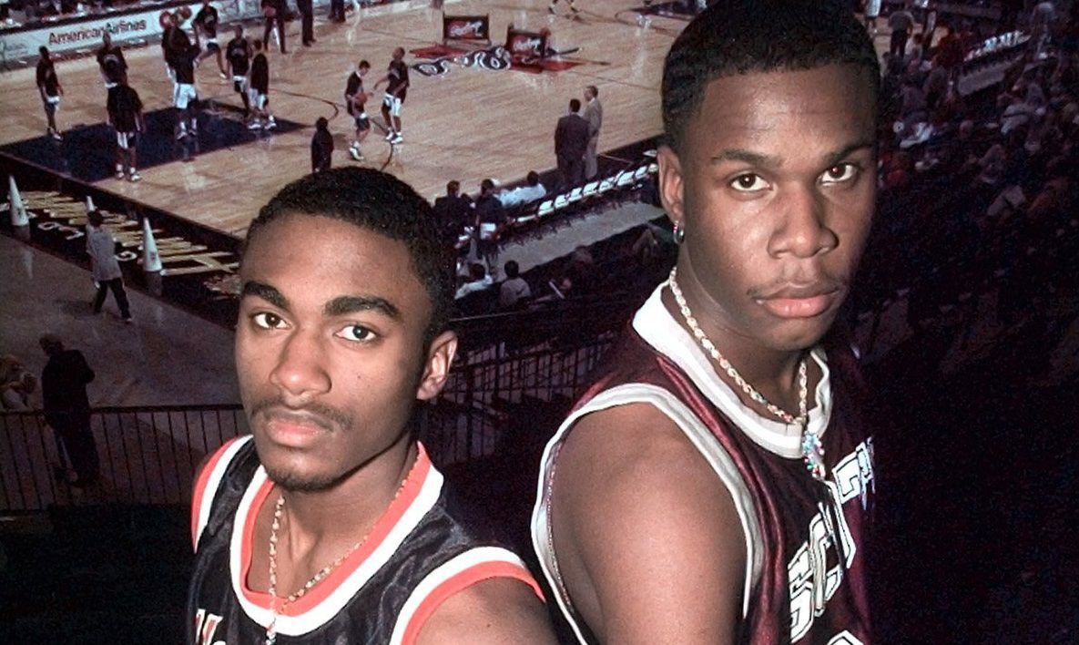 1999: Ebi Ere, McLain (right) and Antonio Reed, Booker T. Washington